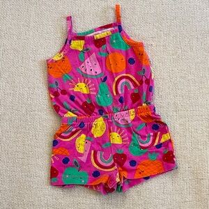 Baby girl romper in pink with fruit pattern. 12 months.